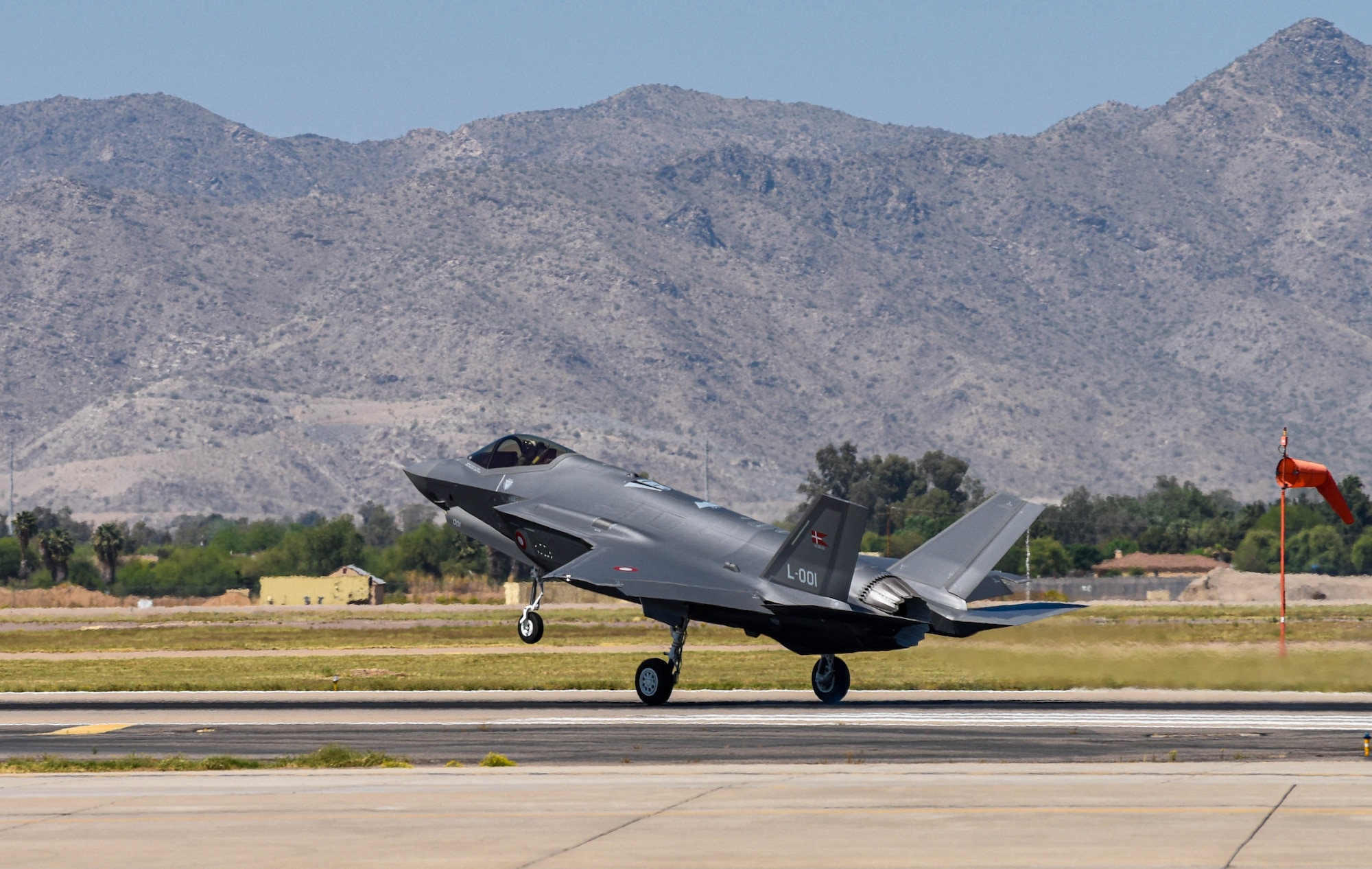 A Royal Danish Air Force F-35A Lightning II assigned to the 308th Fighter Squadron lands, April 13, 2021, at Luke Air Force Base, Arizona.