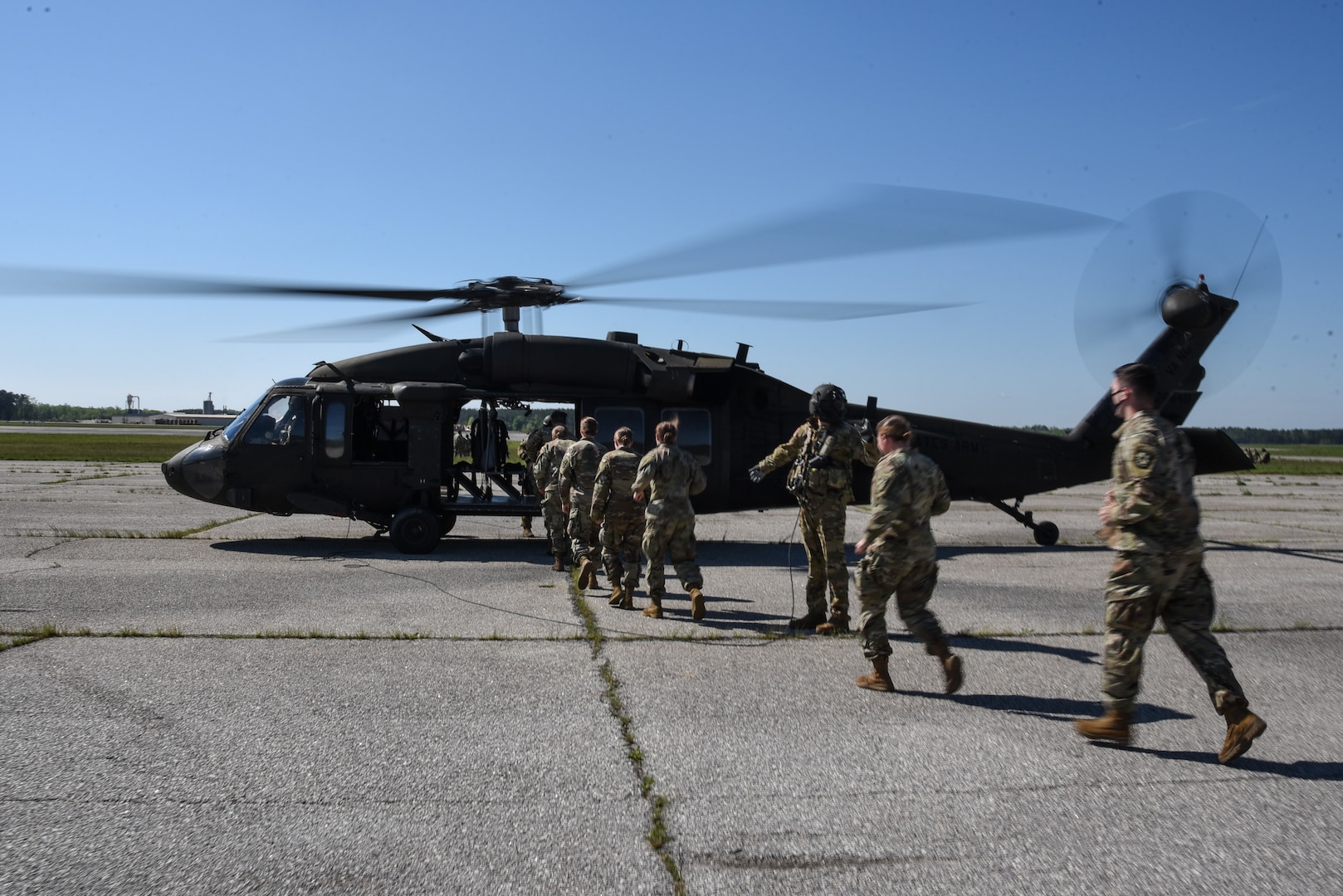 Cadets enrolled in the Virginia Army National Guard’s Simultaneous Membership Program take to the skies on board UH-60 Black Hawk helicopters April 18, 2021, during a three-day field training exercise at Fort Pickett, Virginia. The cadets came together from universities across the state and spent the weekend gaining familiarity with military tasks. (U.S. Army National Guard photo by Sgt. 1st Class Terra C. Gatti)