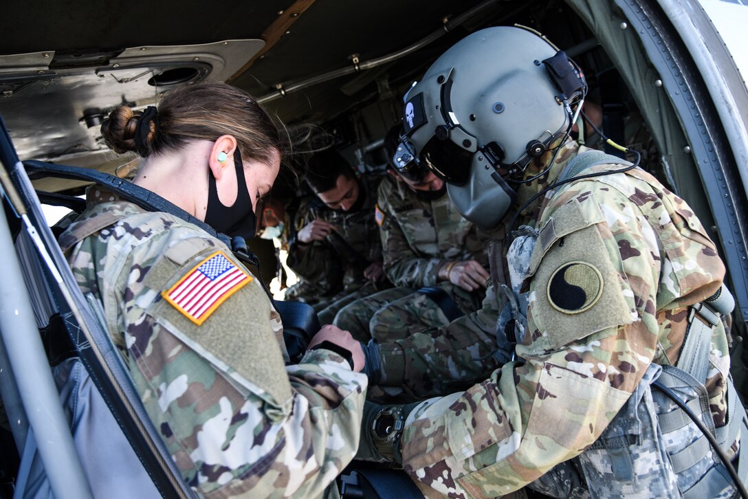 Cadets enrolled in the Virginia Army National Guard’s Simultaneous Membership Program take to the skies on board UH-60 Black Hawk helicopters April 18, 2021, during a three-day field training exercise at Fort Pickett, Virginia. The cadets came together from universities across the state and spent the weekend gaining familiarity with military tasks. (U.S. Army National Guard photo by Sgt. 1st Class Terra C. Gatti)