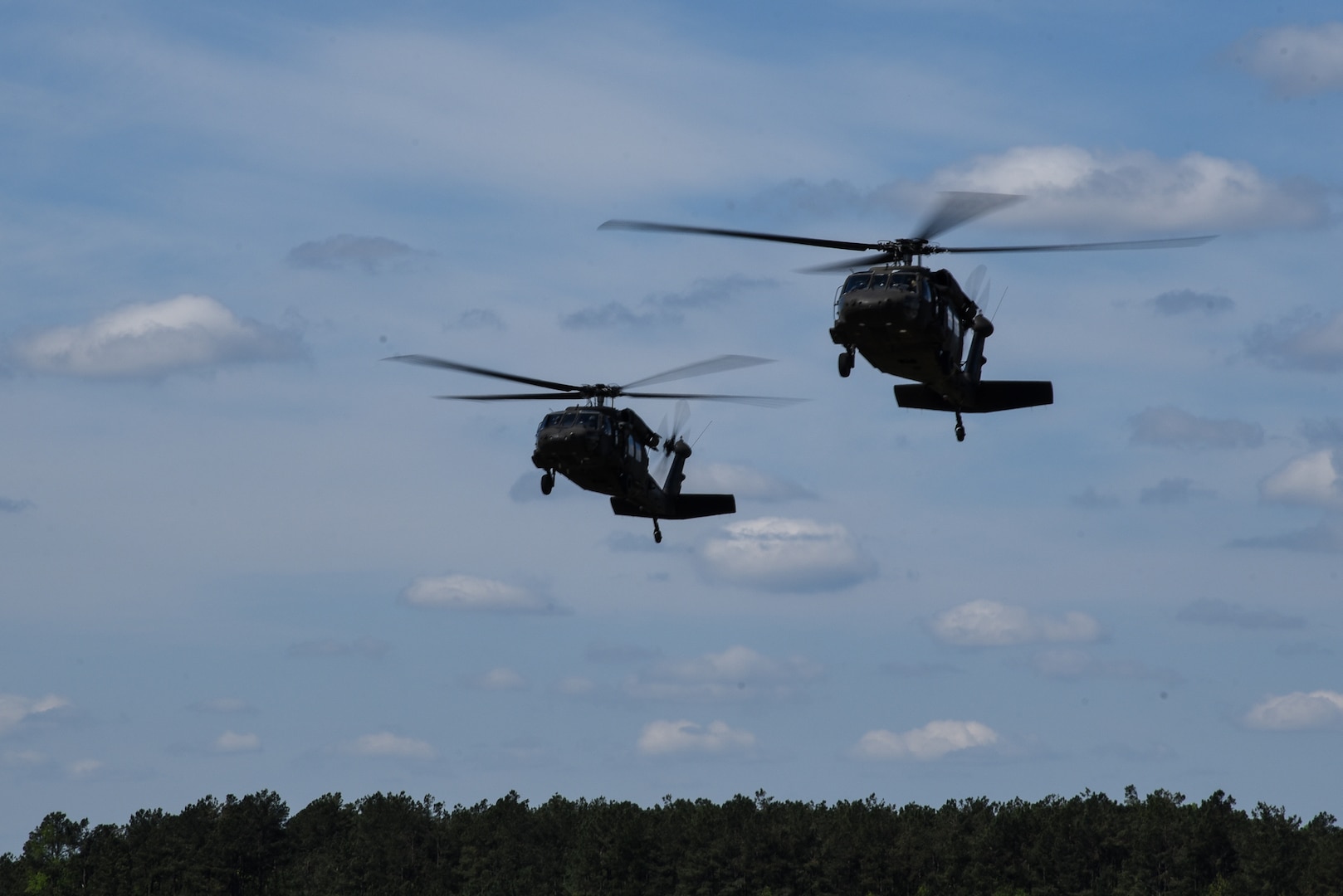 Cadets enrolled in the Virginia Army National Guard’s Simultaneous Membership Program take to the skies on board UH-60 Black Hawk helicopters April 18, 2021, during a three-day field training exercise at Fort Pickett, Virginia. The cadets came together from universities across the state and spent the weekend gaining familiarity with military tasks. (U.S. Army National Guard photo by Sgt. 1st Class Terra C. Gatti)