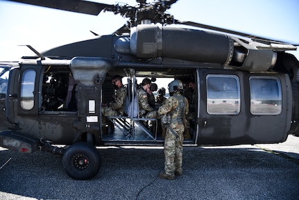 Cadets enrolled in the Virginia Army National Guard’s Simultaneous Membership Program take to the skies on board UH-60 Black Hawk helicopters April 18, 2021, during a three-day field training exercise at Fort Pickett, Virginia. The cadets came together from universities across the state and spent the weekend gaining familiarity with military tasks. (U.S. Army National Guard photo by Sgt. 1st Class Terra C. Gatti)