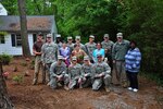 Officer candidates from Class 55 of the Virginia National Guard’s Officer Candidate School clear debris and work on landscape improvements May 4, 2013, as part of their class community project in Richmond, Va. (Photo by Staff Sgt. Terra C. Gatti, Virginia Guard Public Affairs)