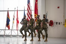 U.S. Marine color guard march on the colors at the Marine Corps Air Station New River sergeant major relief and appointment ceremony at the Center for Naval Aviation Technical Training on MCAS New River, North Carolina, April 16, 2021. The relief and appointment ceremony symbolized the passing of responsibilities and duties from Sgt. Maj. Carlos A. Orjuela to the incoming sergeant major, Sgt. Maj. Douglas W. Gerhardt. (U.S. Marine Corps Lance Cpl. Isaiah Gomez)