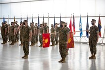U.S. Marines salute during the playing of the National Anthem at the Marine Corps Air Station New River sergeant major relief and appointment ceremony at the Center for Naval Aviation Technical Training on MCAS New River, North Carolina, April 16, 2021. The relief and appointment ceremony symbolized the passing of responsibilities and duties from Sgt. Maj. Carlos A. Orjuela to the incoming sergeant major, Sgt. Maj. Douglas W. Gerhardt. (U.S. Marine Corps Lance Cpl. Isaiah Gomez)