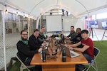 Members of Naval Surface Warfare Center, Port Hueneme Division’s Cyber Red Team Development Program (RTDP) conduct training and tabletop exercises in penetration testing to protect the integrity and readiness of U.S. Navy systems at the Fathomwerx Lab, Feb. 13, 2020. Pictured are RTDP members (clockwise from left), Shane Bennett, Calvin Raines, Christopher Draper, Steven Coleman, Devin Gavin and Bao Huynh. The team recently captured Third Place in the Navy-sanctioned HACKtheMACHINE contest.