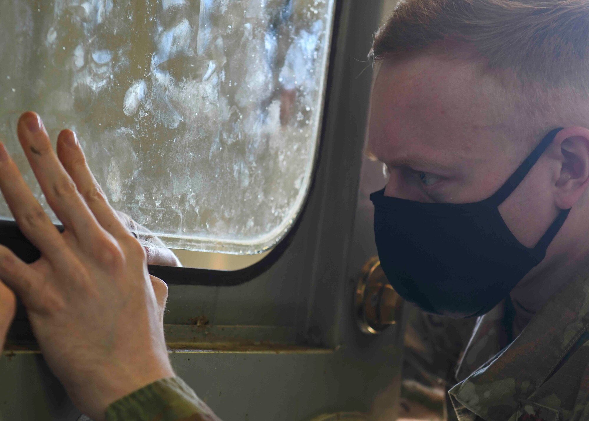 Staff Sgt. Alexander Tallant, 92nd Maintenance Squadron aircraft structural maintenance craftsman, adjusts a window on a railcar simulator on Fairchild Air Force Base, Washington, April 16, 2021. Tallant and Tech Sgt. Brian Stolz, 92nd MXS aircraft structural maintenance craftsman, visit the airpark once a month to ensure the aircraft and structures are safe. (U.S. Air Force photo by Airman 1st Class Kiaundra Miller)
