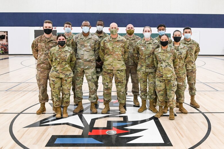 Airmen pose for a group photo.