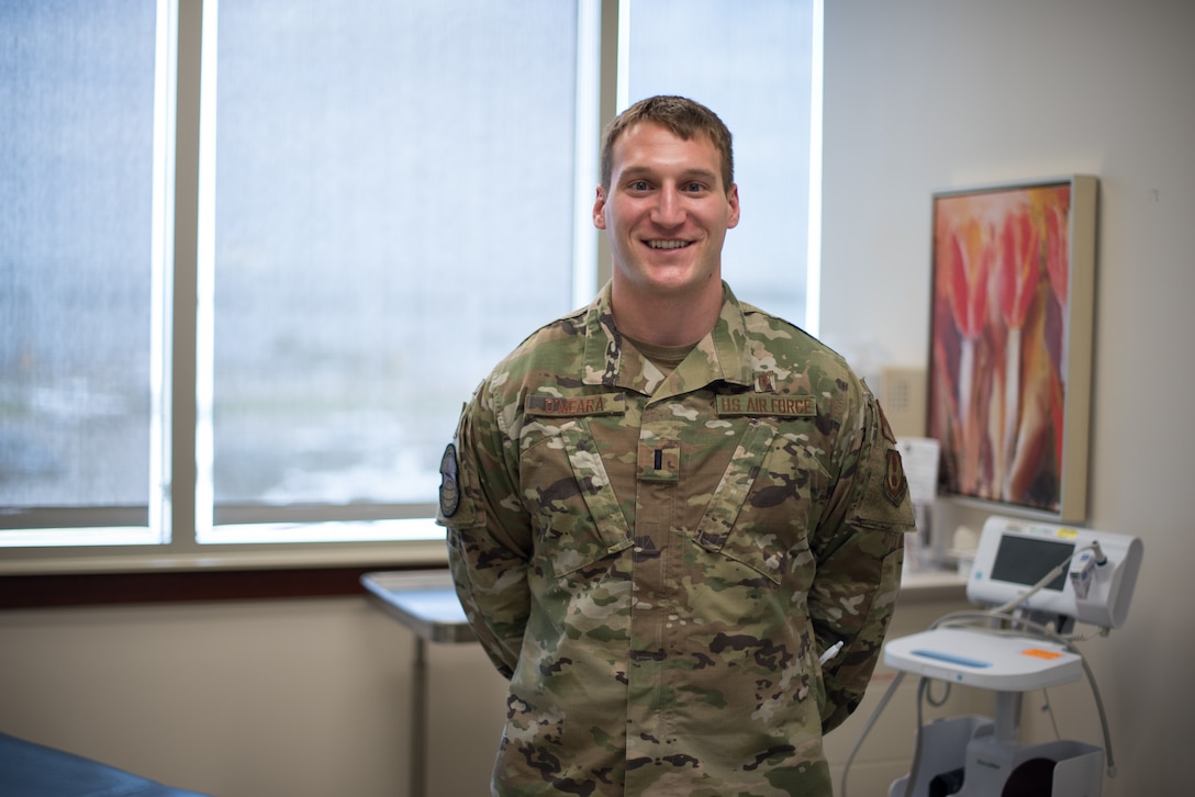 First Lt. Aaron O'Meara standing in medical exam room.