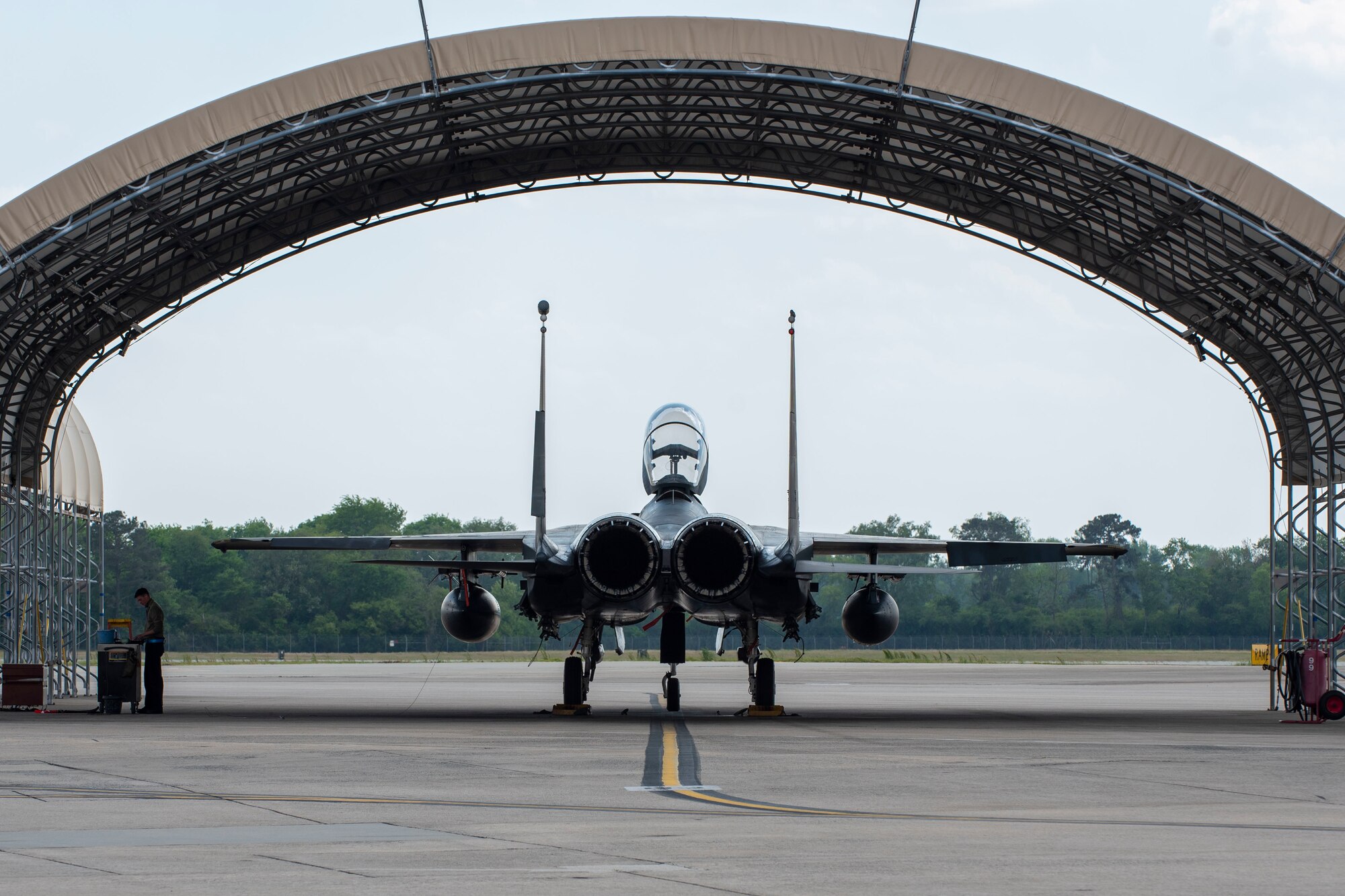 Senior Airman Justin Stone, 334th Fighter Squadron crew chief, documents the service he provided to an F-15E Strike Eagle at Seymour Johnson Air Force Base, North Carolina, April 21, 2021.