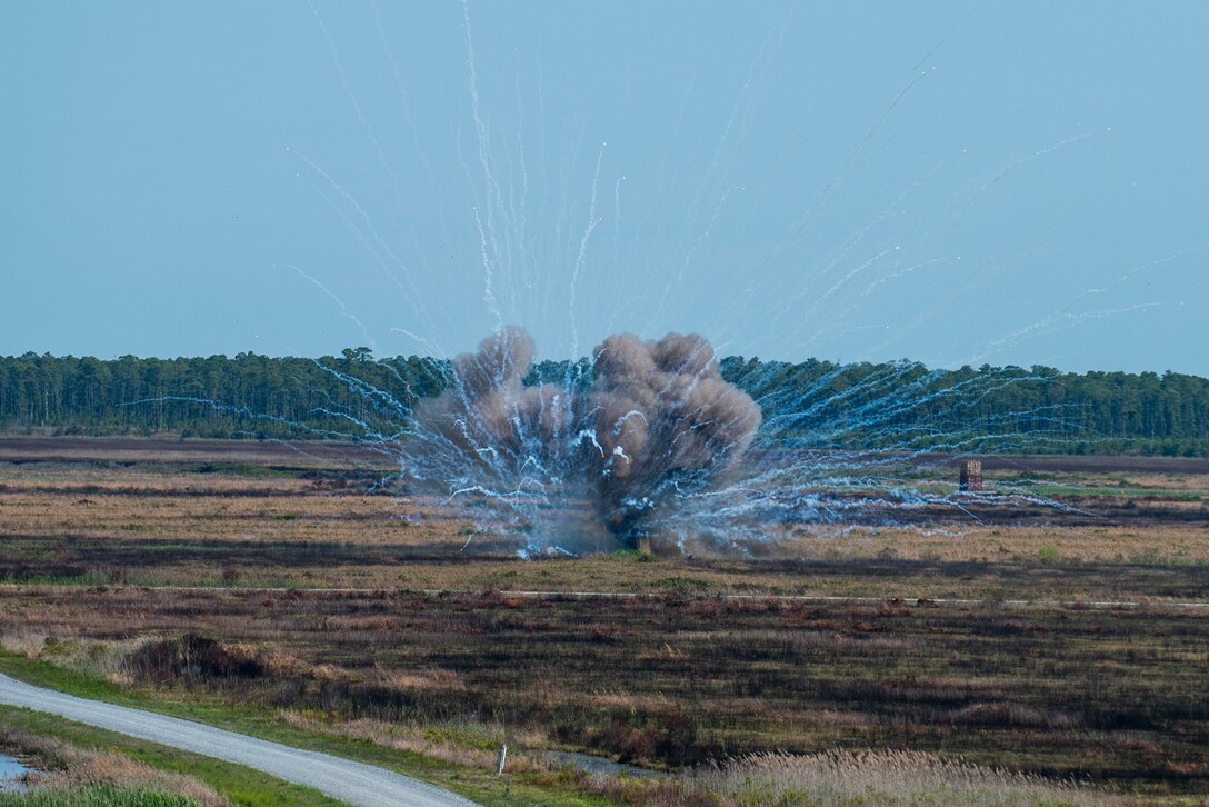 C-4 explosives are double stacked and detonated on used bomb dummy units (BDU) at Dare County Bomb Range, North Carolina, April 19, 2021.