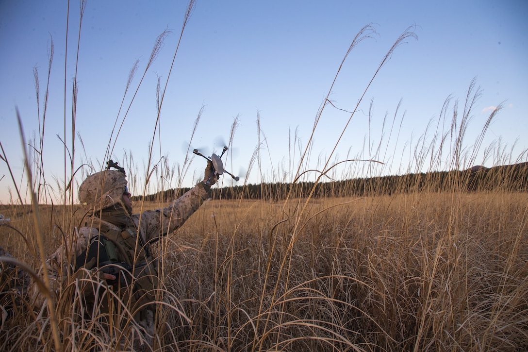 U.S. Marine Corps Lance Cpl. Braxton Lee, a rifleman with Kilo Company, 3rd Battalion, 8th Marine Regiment, utilizes a drone at Combined Arms Training Center, Camp Fuji, Japan on Jan. 22, 2021. Marines used drones to scan for enemy positions from the defense during Joint Exercise Littoral Strike, the culminating event for Fuji Viper 21.2. The exercise strengthened interoperability and challenged infantry formations, demonstrating that marines can facilitate joint force multi-domain maneuver in support of naval operations. 3/8 is forward-deployed in the Indo-Pacific under 4th Marine Regiment, 3rd Marine Division. Lee is a native of Florence, South Carolina.