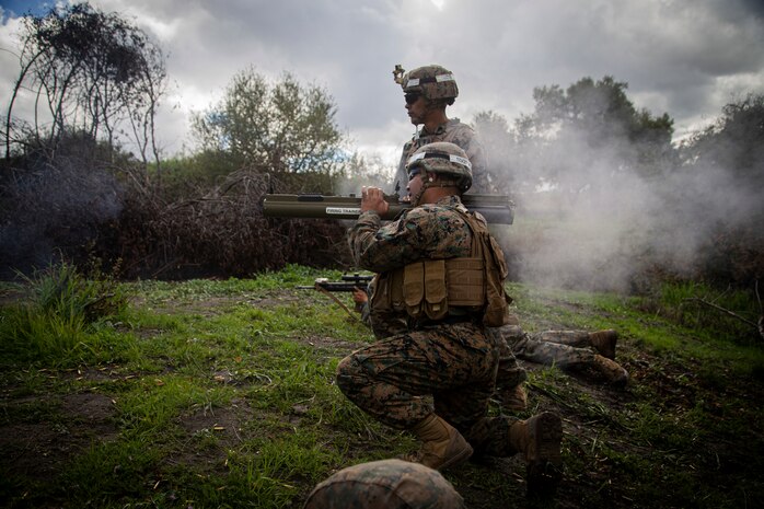 A U.S. Marine combat instructor with Alpha Company, Infantry Training Battalion, School of Infantry - West, fires an M72 light anti-tank weapon during fire and maneuver drills as part of the seventh week of the Infantry Marine Course on Marine Corps Base Camp Pendleton, Calif., March 11, 2021. IMC is a 14-week pilot course designed to create better trained and more lethal entry-level infantry Marines prepared for near-peer conflicts. The course uses a redesigned learning model for students intended to develop their capabilities for independent and adaptive thought and action. The program of instruction for IMC has been in development for a year and follows guidance from the 2019 Commandant's Planning Guidance and Force Design 2030.