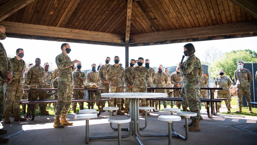 Chief Master Sgt. of the Air Force JoAnne S. Bass has a conversation with 2nd Communications Squadron Airmen during her visit at Barksdale Air Force Base, Louisiana, April 22, 2021. During the tour, Bass spent time speaking one on one with Airmen of the 2nd Bomb Wing to receive feedback and answer questions about the future of the Air Force. (U.S. Air Force photo by Airman 1st Class Jacob B. Wrightsman)