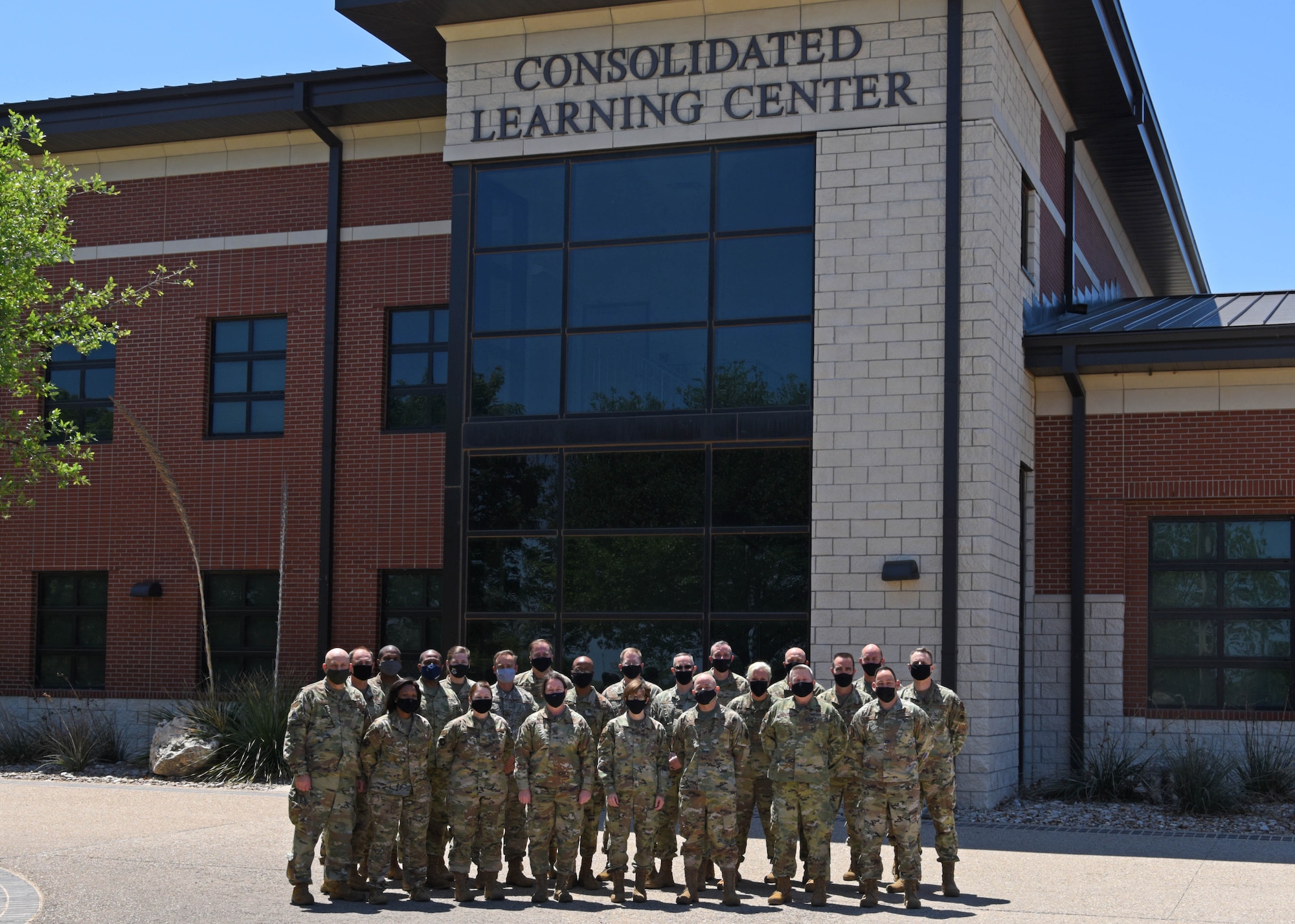 Intelligence leaders from the Intelligence Development Team pose for a photo at the Consolidated Learning Center on Goodfellow Air Force Base, Texas, April 21, 2021. The Intelligence DT is a group of senior officers tasked to assign intelligence officers to their positions. (U.S. Air Force photo by Senior Airman Ethan Sherwood)