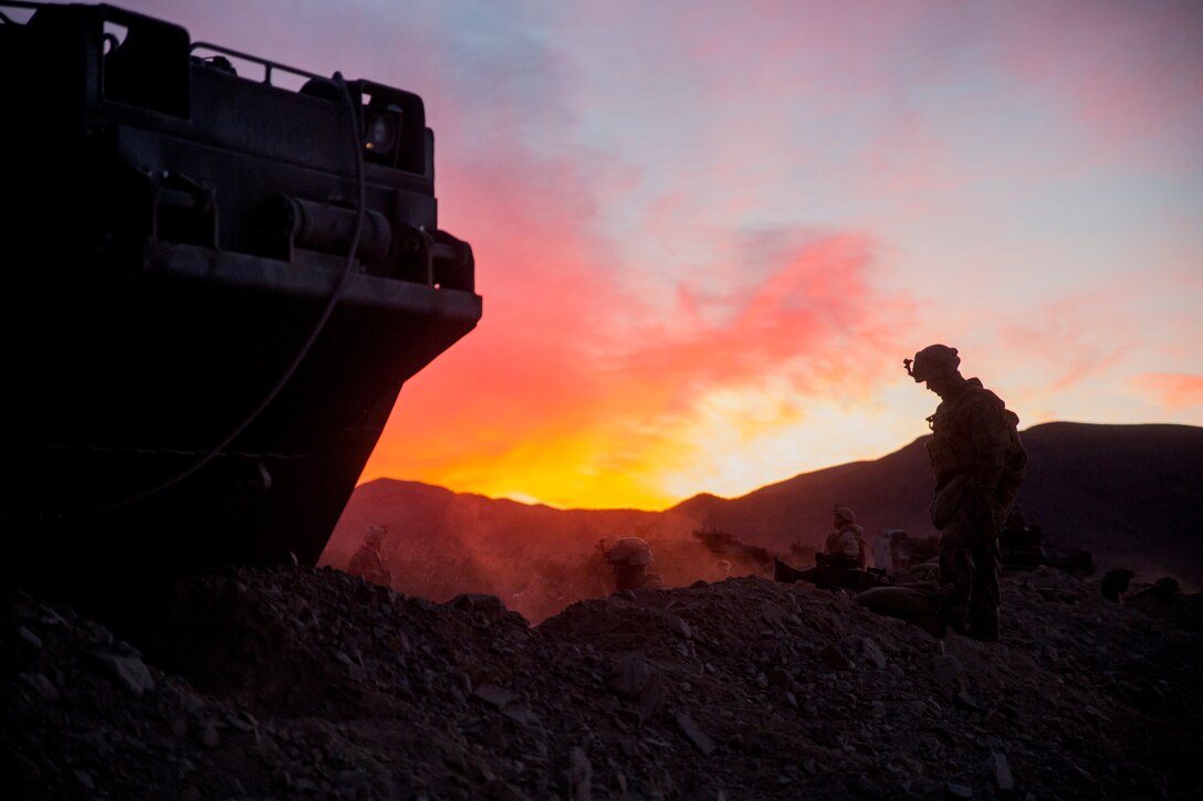 U.S. Marines with 3rd Battalion, 7th Marine Regiment, 1st Marine Division, dig fighting holes during a Marine Corps Combat Readiness Evaluation (MCCRE) at Marine Corps Air Ground Combat Center Twentynine Palms, Calif., Nov. 29, 2017. MCCREs are conducted to ensure unit standardization and combat readiness in preparation for operational deployments. (U.S. Marine Corps photo by Cpl. Joseph Prado)