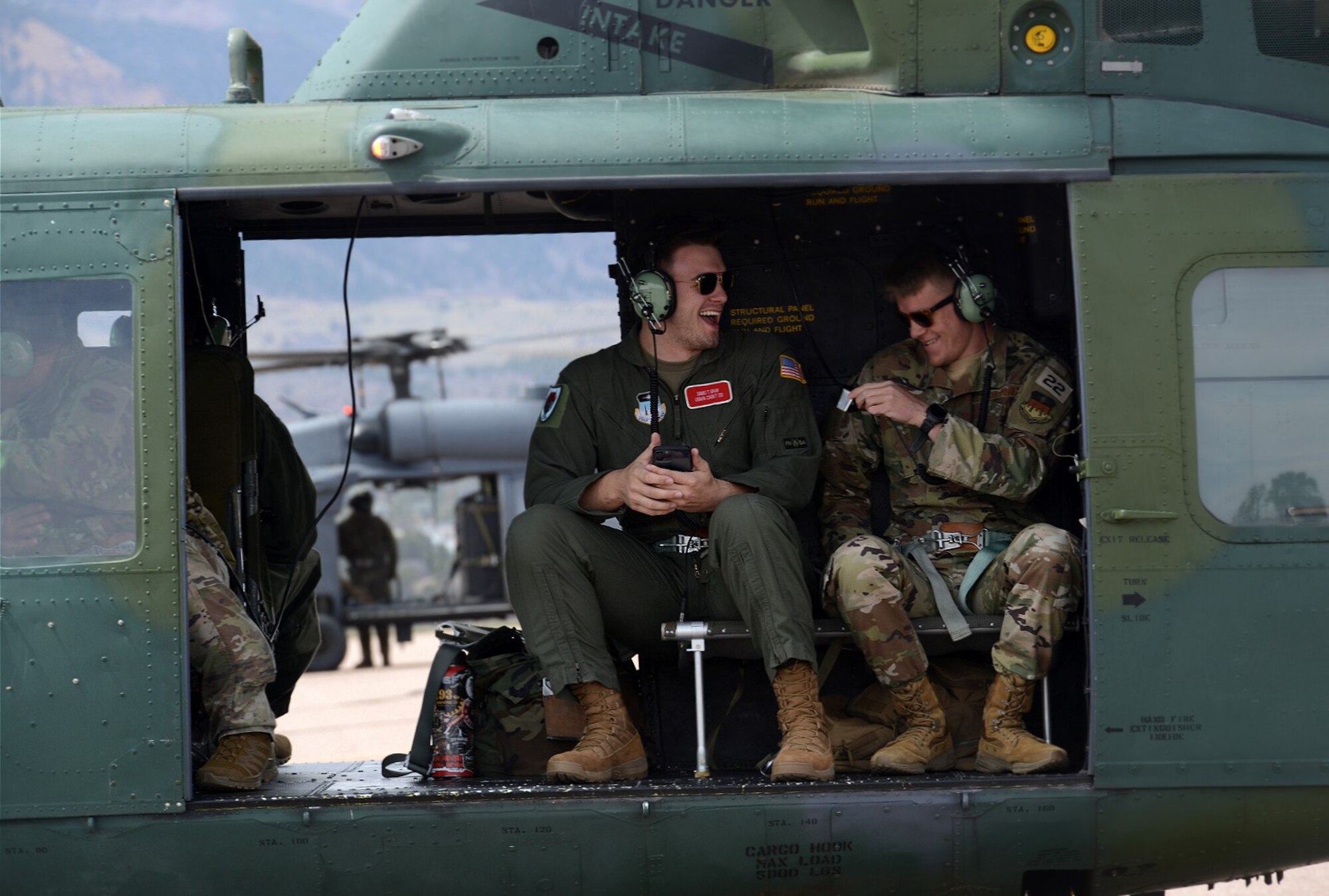 Cadets 2nd Class George Biery (left) and David Grey get ready to fly aboard a UH-1 H helicopter