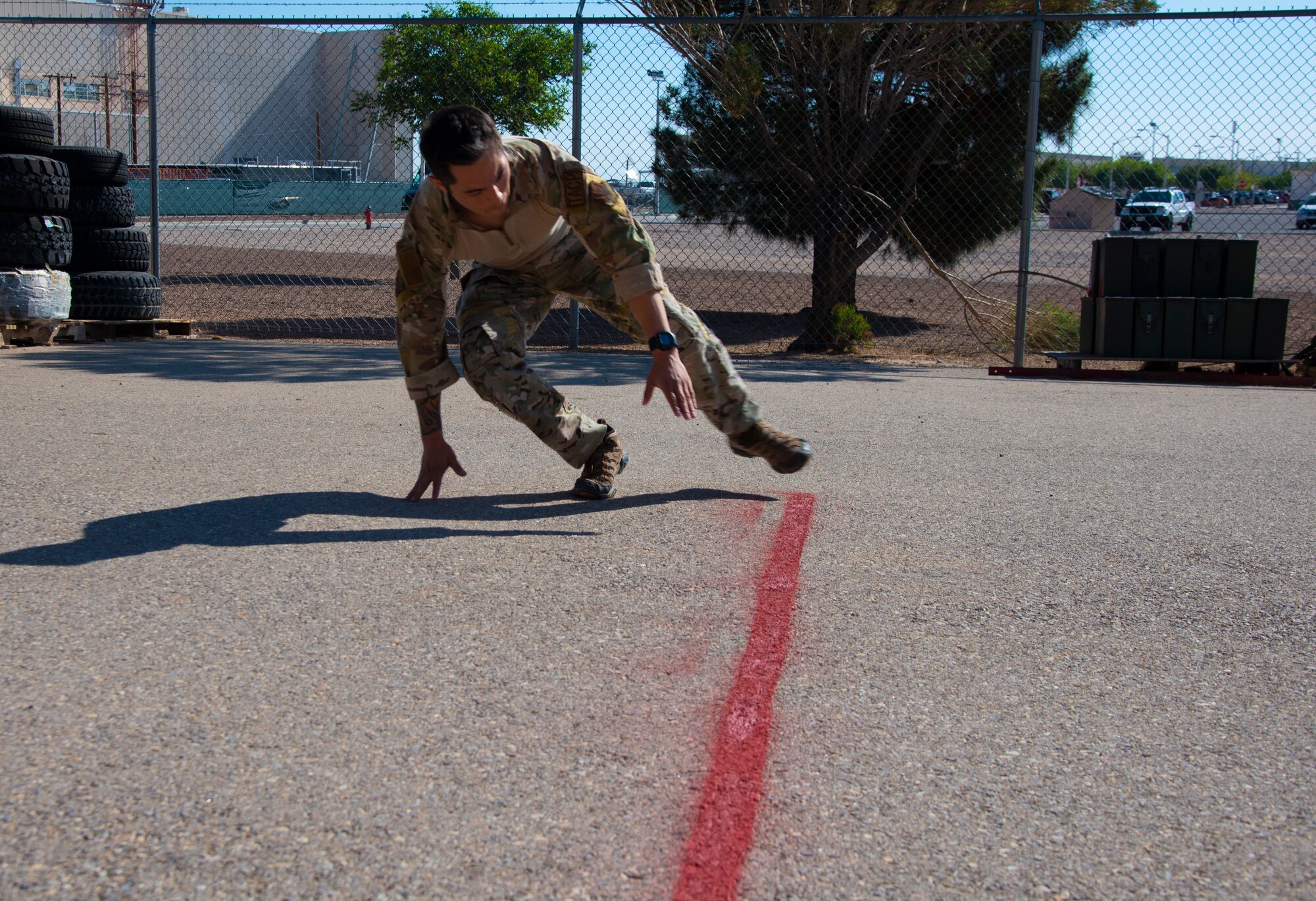 A U.S. Air Force Tactical Air Control Party specialist does an agility test during the 2021 Wraith Challenge, April 19, 2021, on Fort Bliss, Texas. The first day of the Wraith Challenge started with a physical test, which includes a three-mile ruck, standing long jumps, an agility test, sprints, farmer carries and a one-and-a-half-mile run. (U.S. Air Force photo by Airman 1st Class Jessica Sanchez)