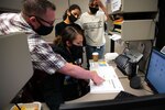 A team of 28th Medical Group staff learn how to use the new MHS Genesis electronic health record system at Ellsworth Air Force Base, S.D., during the system go-live event April 24, 2021.