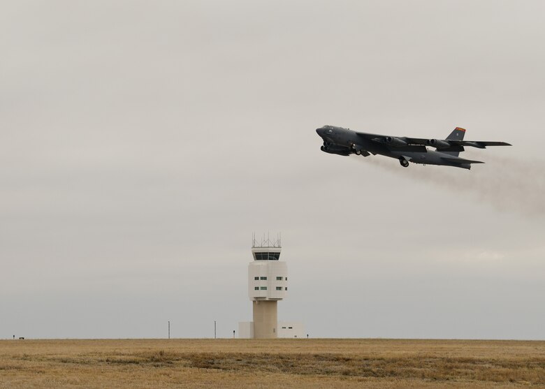 A B-52H Stratofortress takes off on April 25, 2021 at Minot Air Force Base, North Dakota. The bomber is one of two B-52 aircraft that arrived to Al Udeid Air Base, Qatar, April 26, joining two additional B-52 bombers that arrived April 23. The bombers are deployed to protect U.S. and coalition forces as they conduct drawdown operations from Afghanistan. U.S. Central Command is committed to providing the necessary force protection to ensure the drawdown is conducted in a safe and orderly manner. (U.S. Air Force photo by Airman 1st Class Evan J. Lichtenhan)