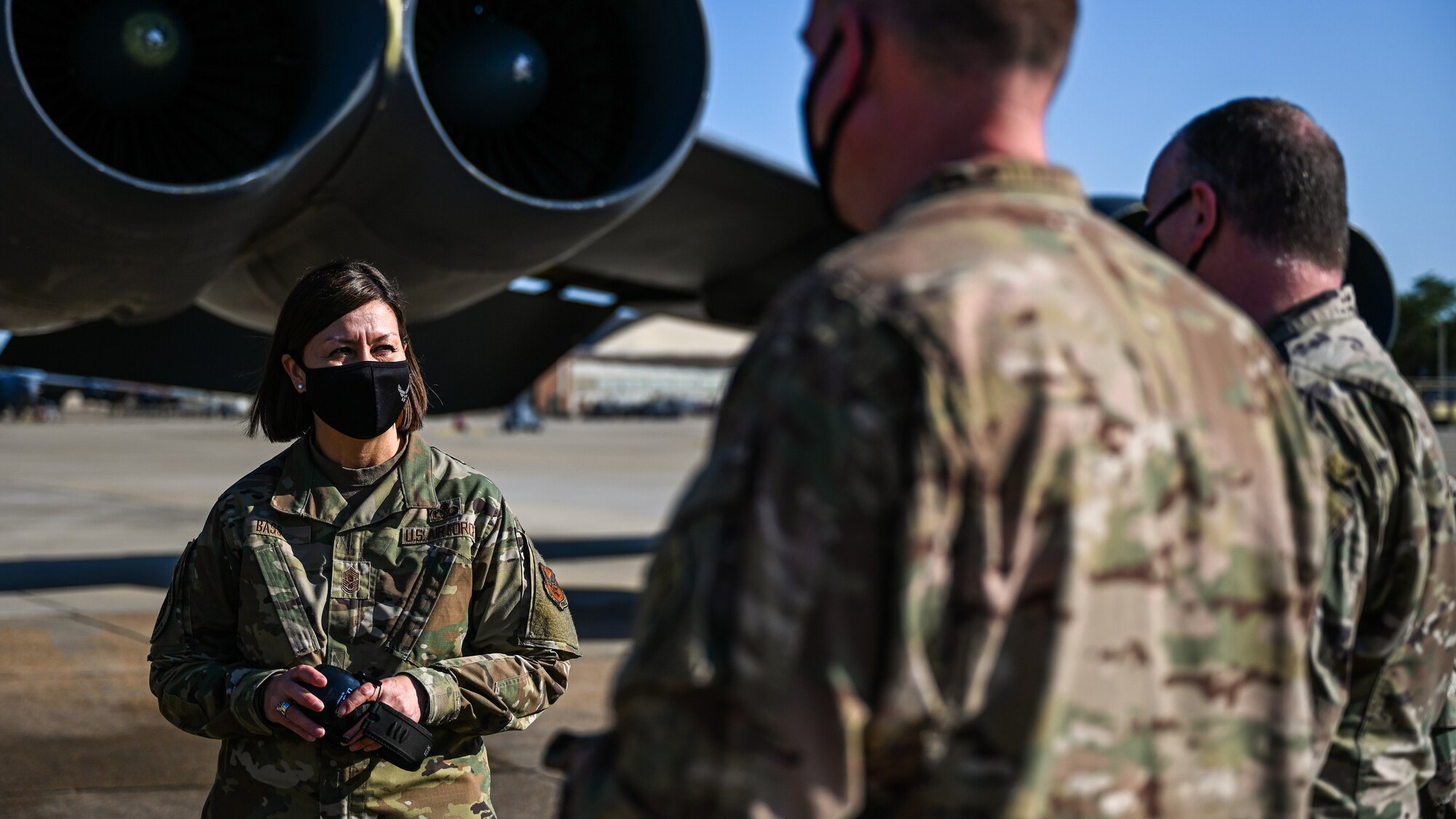 Chief Master Sgt. of the Air Force JoAnne S. Bass, speaks with members of the 2nd Aircraft Maintenance Squadron during a tour of Barksdale Air Force Base, Louisiana, April 21, 2021. During the tour, Bass familiarized herself with the mission of the 2nd Bomb Wing. (U.S. Air Force photo by Senior Airman Christina Graves)
