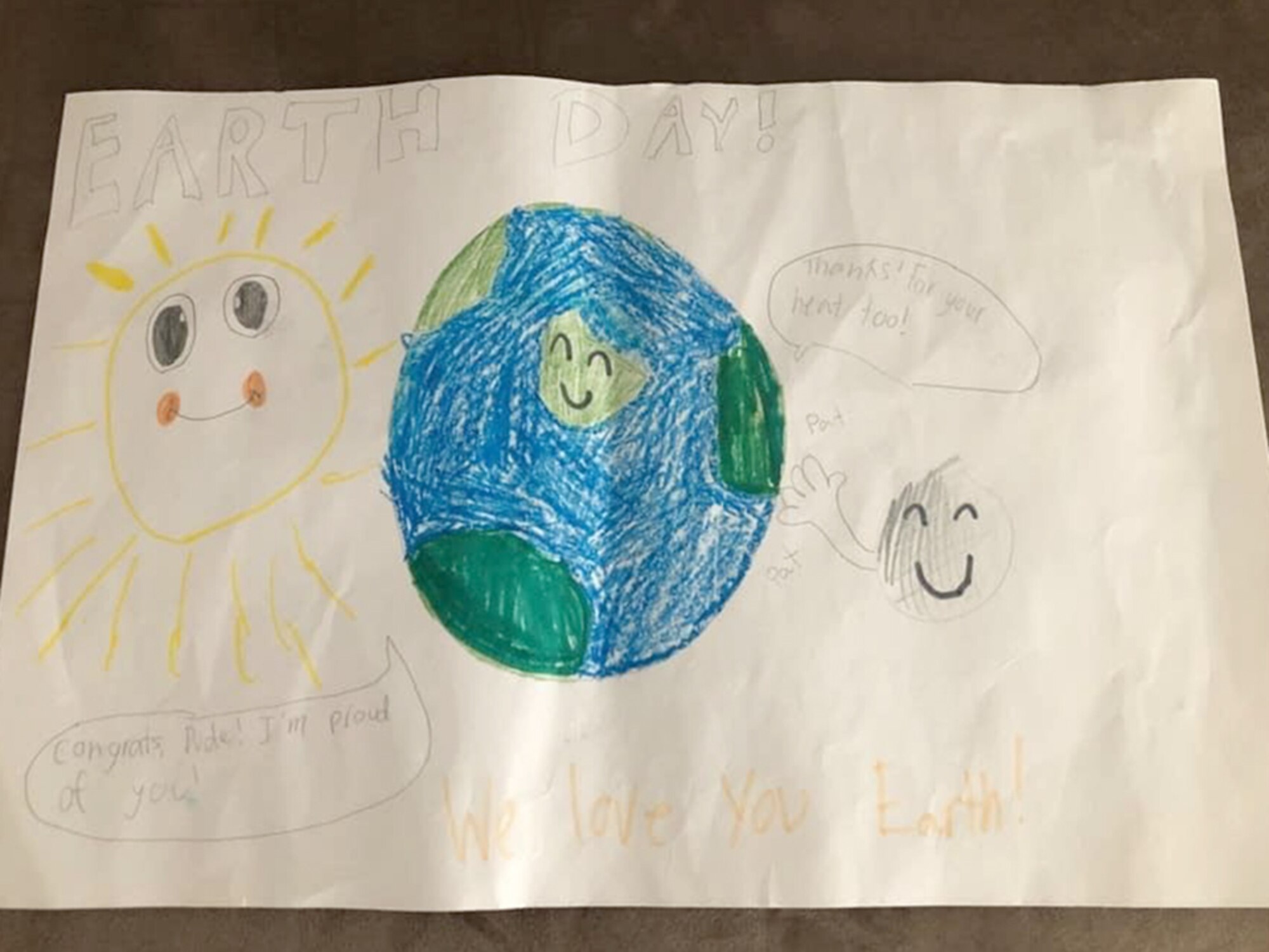 A child’s drawing sits on a desk during a week in which several events were held to commemorate Earth Day at Ramstein Air Base