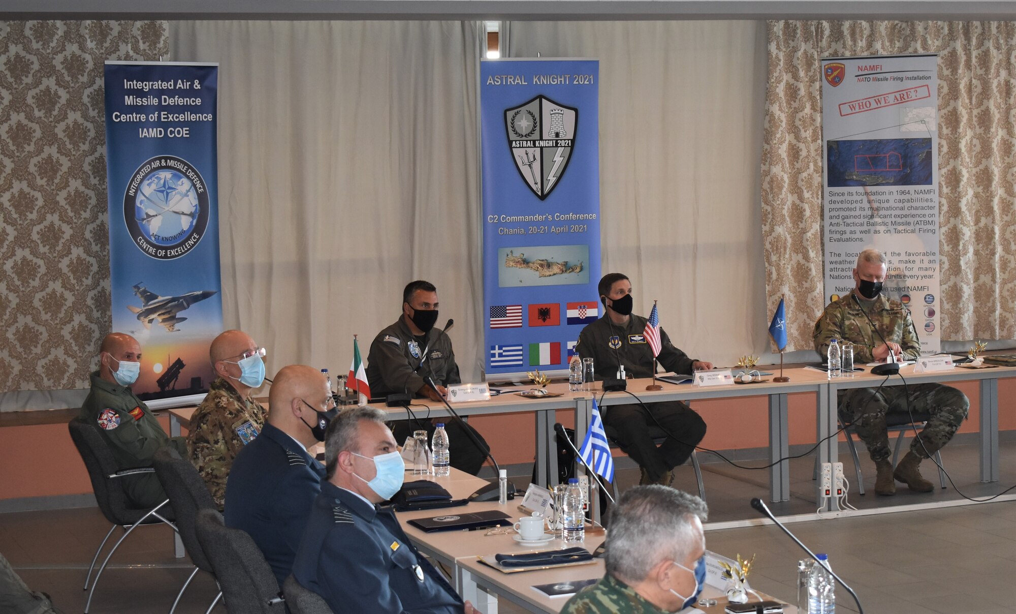 Commanders attending the Command and Control Commanders Conference listen to a briefing about exercise Astral Knight 21 in Chania, Crete on April 20, 2021. The C2CC was created to provide a venue for commanders across the area of operations to collaborate, bringing their ideas, experiences, and discussions to the table to get a big picture of what to expect during AK21.