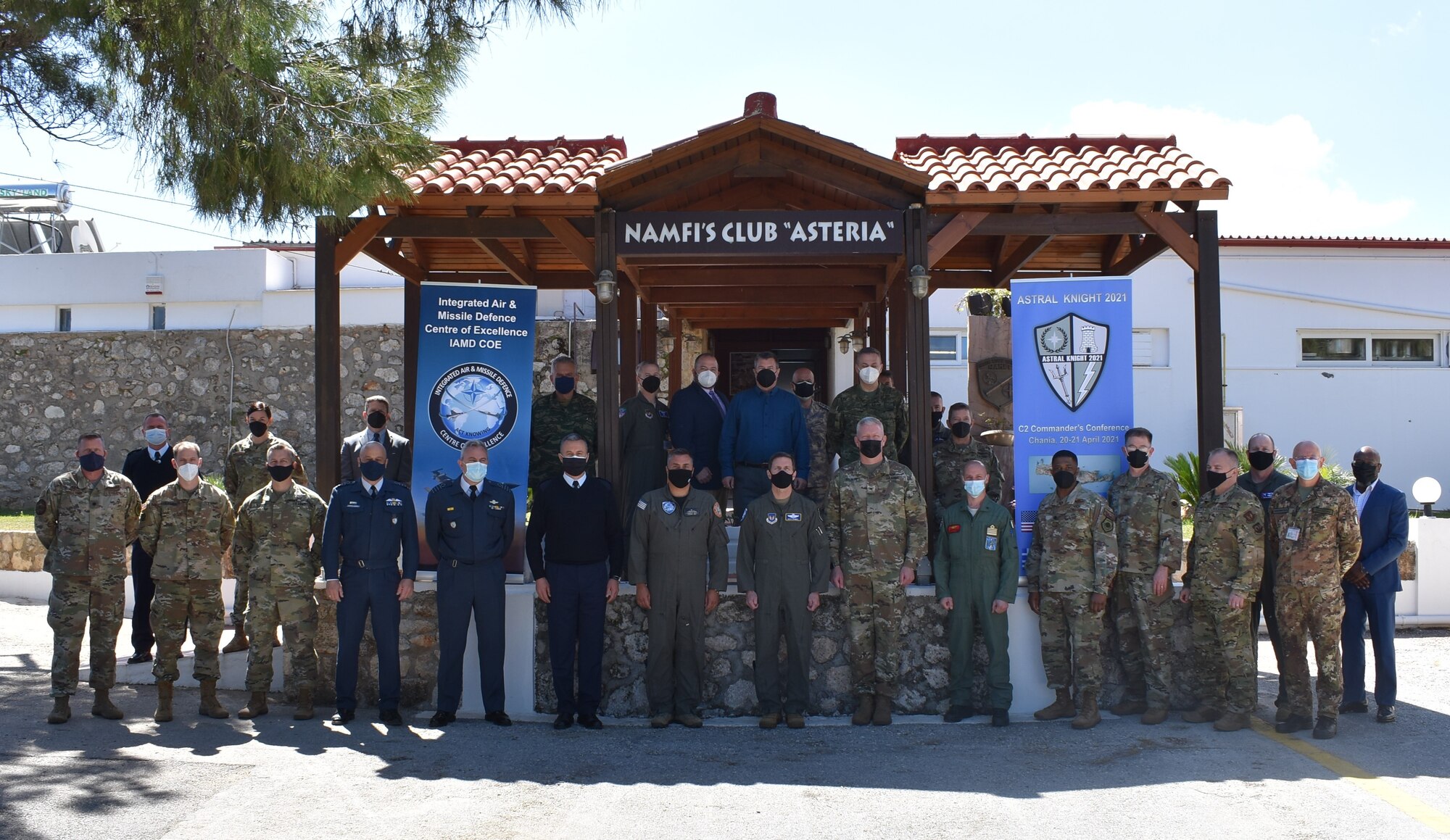 Participants of the Command and Control Commanders Conference pose for a group photo at the NATO Air and Missile Firing Installation conference center in Chania, Crete on April 21, 2021. Commanders from six NATO nations attended the two-day conference to discuss IAMD coordination in the southern European region, in preparation for the upcoming USAFE-AFAFRICA-led exercise, AK21.