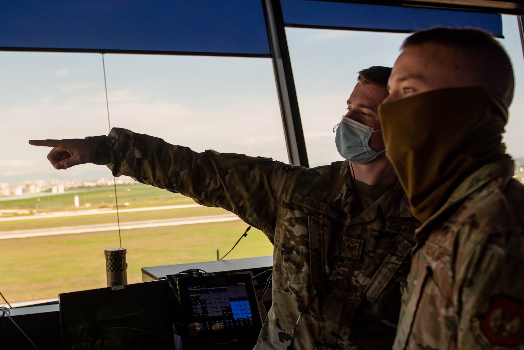 An Airman works in the ATC tower