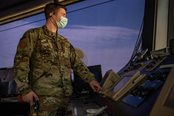 An Airman works in the ATC tower