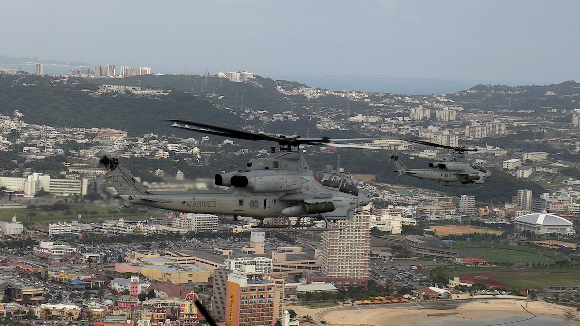 U.S. Marine Corps AH-1Z Viper attack helicopters assigned to Marine Light Attack Helicopter Squadron 267 fly during a mission rehearsal exercise over Okinawa, Japan, April 16, 2021. The MRX served as a culminating event for HMLA-267 as they near the end of their time in Okinawa as part of the Unit Deployment Program.