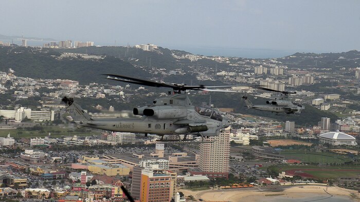 U.S. Marine Corps AH-1Z Viper attack helicopters assigned to Marine Light Attack Helicopter Squadron 267 fly during a mission rehearsal exercise over Okinawa, Japan, April 16, 2021. The MRX served as a culminating event for HMLA-267 as they near the end of their time in Okinawa as part of the Unit Deployment Program.