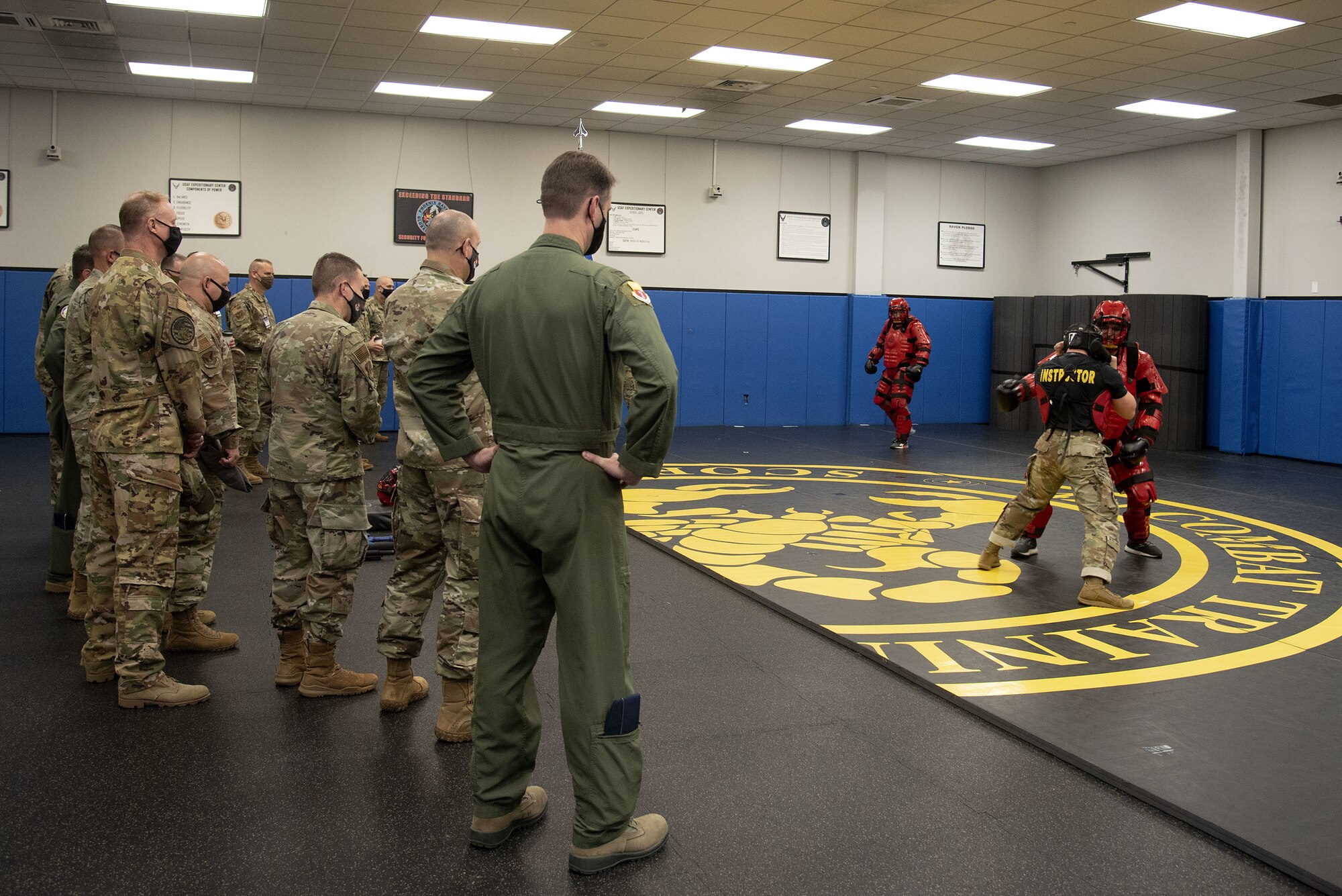 Phoenix Raven Qualification Course instructors assigned to the 421st Combat Training Squadron demonstrate how to neutralize a threat to Total Force Mobility Air Forces leadership during Total Force Phoenix Rally, April 21, 2021, at the U.S. Air Force Expeditionary Center headquarters on Joint Base McGuire-Dix-Lakehurst, New Jersey. U.S. Air Force Expeditionary Operations School instructors were given the opportunity to highlight how they contribute to AMC at its mission. (U.S. Air Force photo by Master Sgt. Ashley Hyatt)