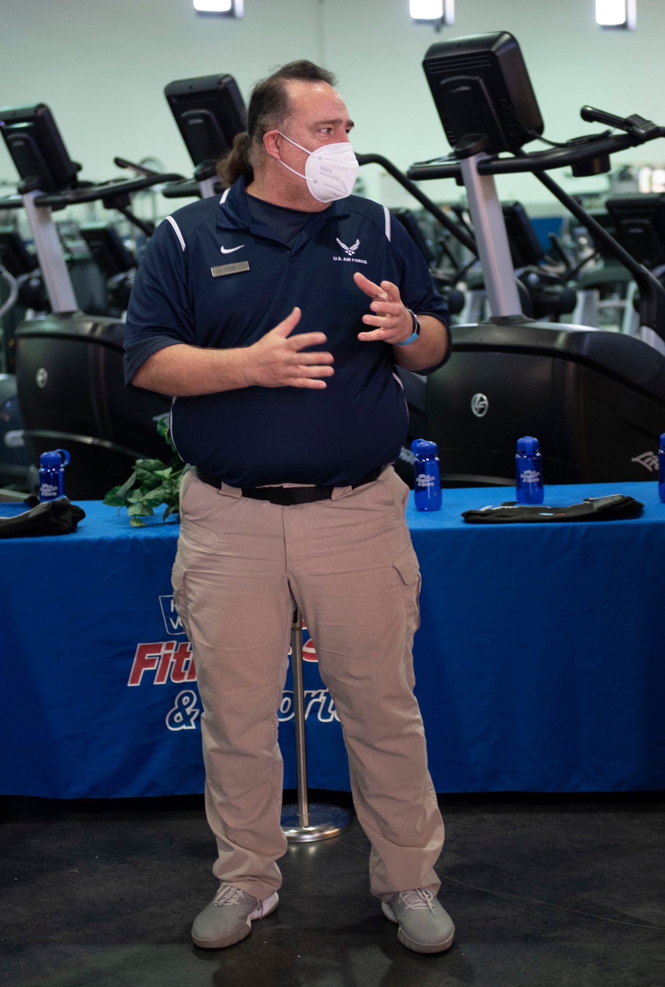 Man speaking at ceremony.