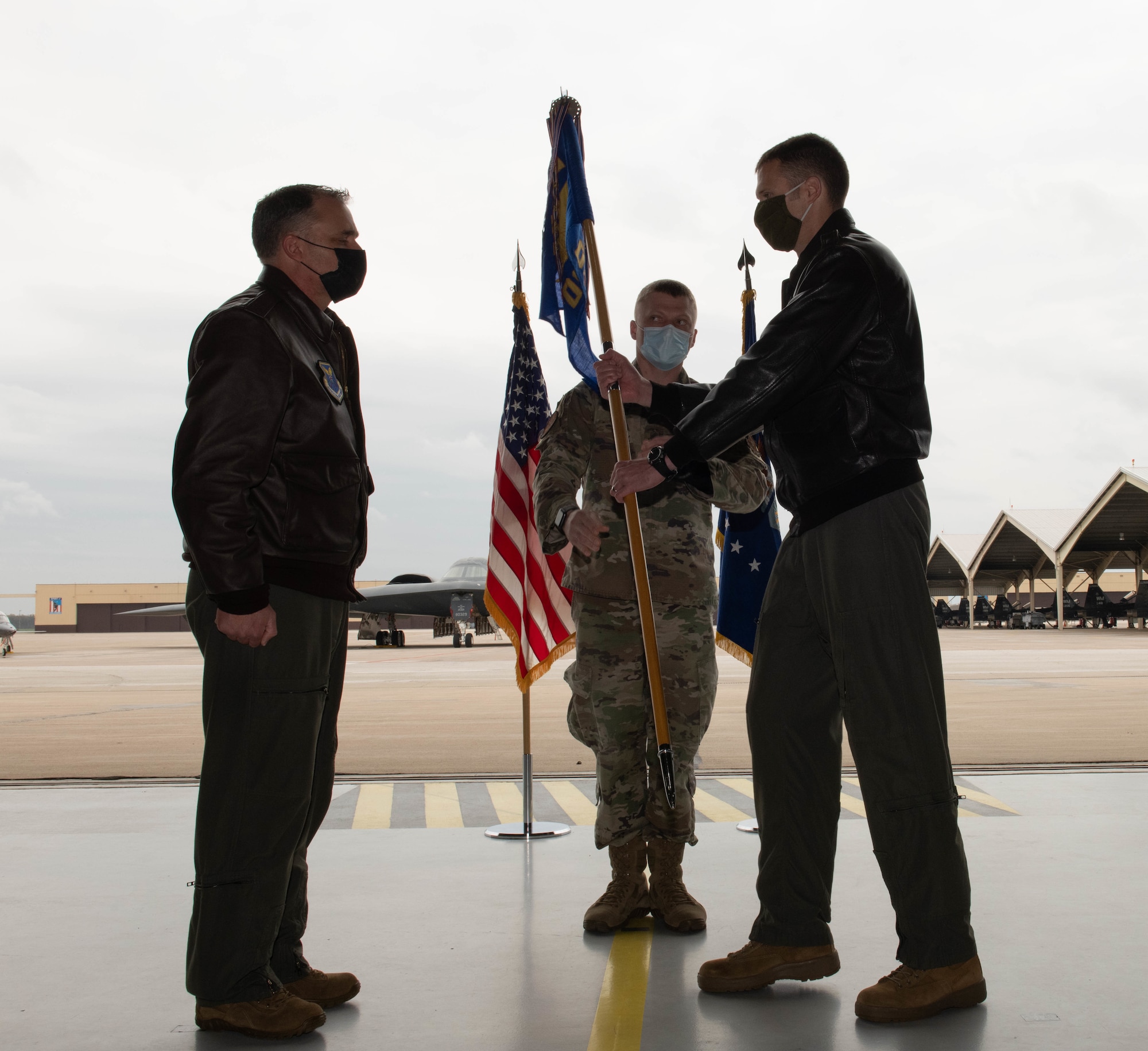 The change of command ceremony is a military tradition that formally signifies the transfer of responsibility for a unit from one commanding officer to another, symbolized through the passing of a guidon.