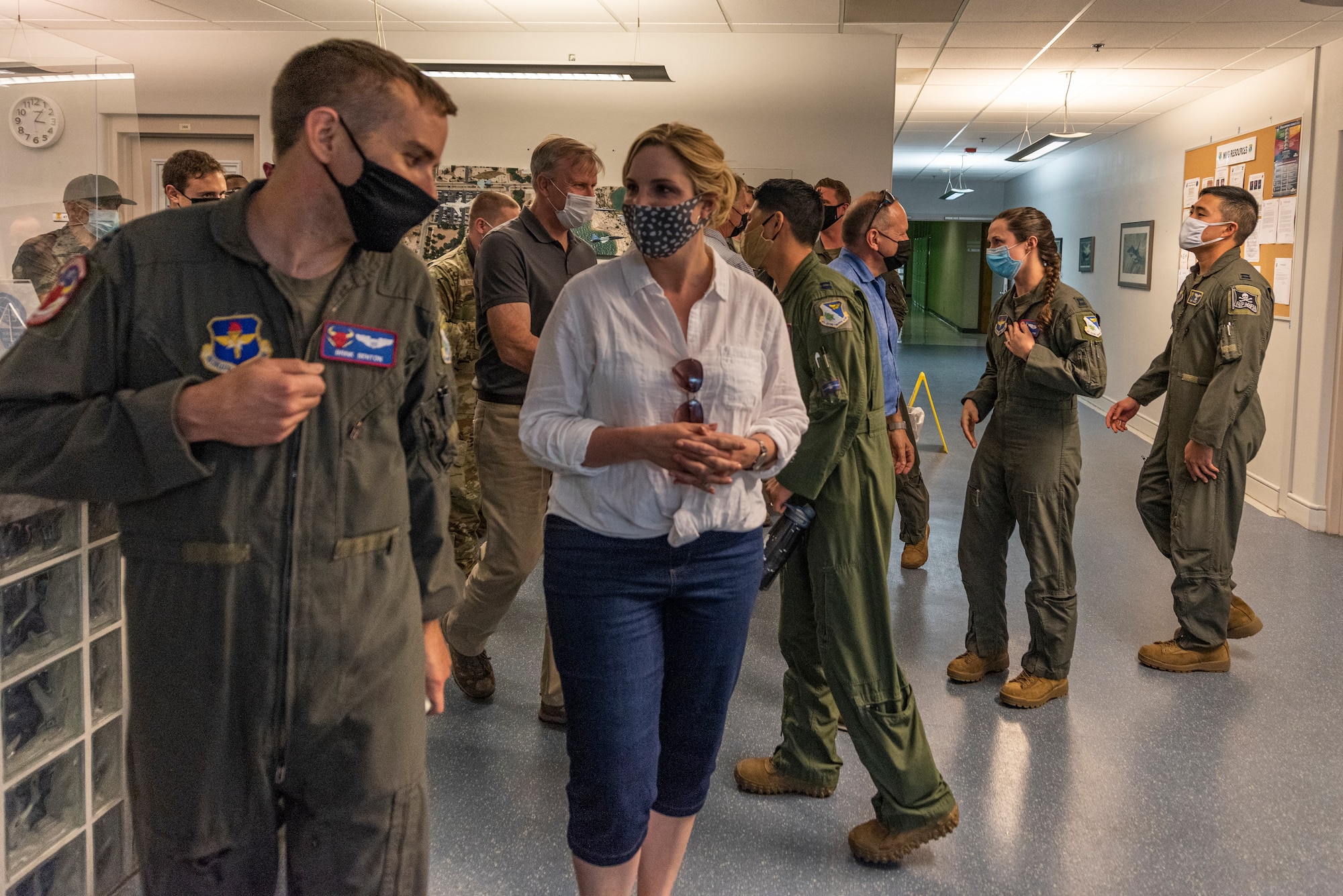 Capt. John Benson, 87th Flying Training Squadron instructor pilot, introduces himself to U.S. Rep. Ashley Hinson as they walk to the training simulators, on April 8, 2021 at Laughlin Air Force Base, Texas. The group of congressional members experienced how Team XL trains combat-ready Airmen, leaders and pilots through a hands-on trail of the simulators with the direction of the instructor pilots who mold future generations of aviators. (U.S. Air Force photos by Senior Airman Anne McCready)