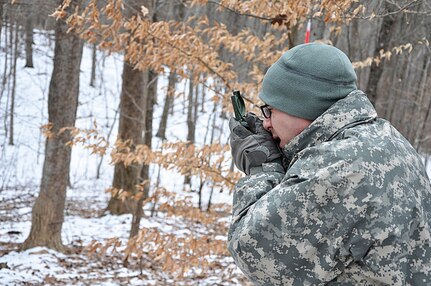 Officer candidates from Class 57 of the Virginia National Guard’s Officer Candidate School conduct land navigation training Jan. 25, 2014, at Fort Pickett, Va., during the Zero Phase of the course. For many of the candidates, this was their first drill with the OCS program. (Photo by Staff Sgt. Terra C. Gatti, Virginia Guard Public Affairs)