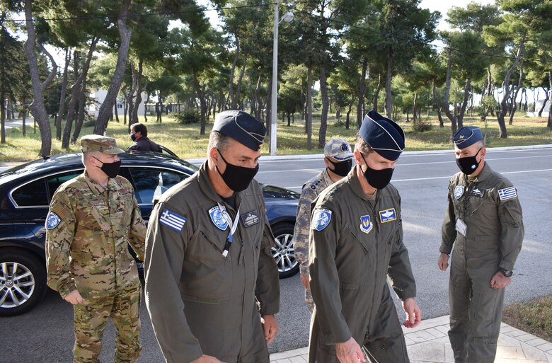 Hellenic Air Force Col. Evangelos Tzikas (left) walks U.S. Air Force Maj. Gen. Greg Semmel (right) into the newly formed Integrated Air and Missile Defense Center of Excellence for a facility tour in Chania, Crete on April 21, 2021. The IAMD COE was recently approved as a multinational COE where subject matter experts from five nations collaborate thoughts and inputs for the IAMD domain.