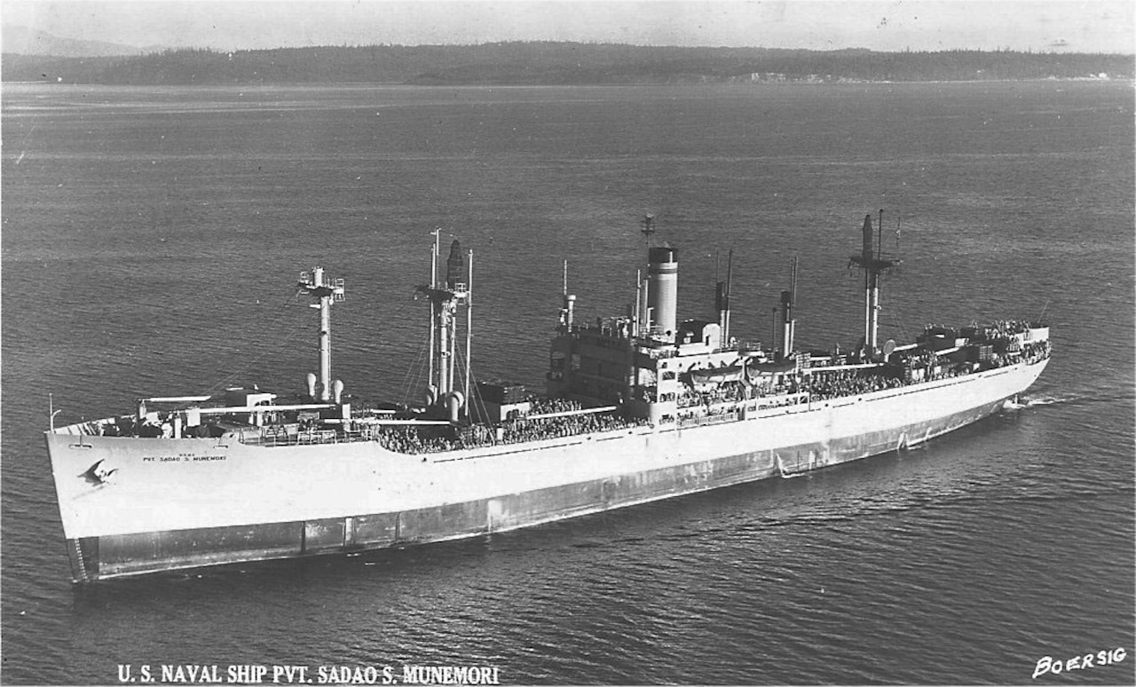 A large ship floats on the water.