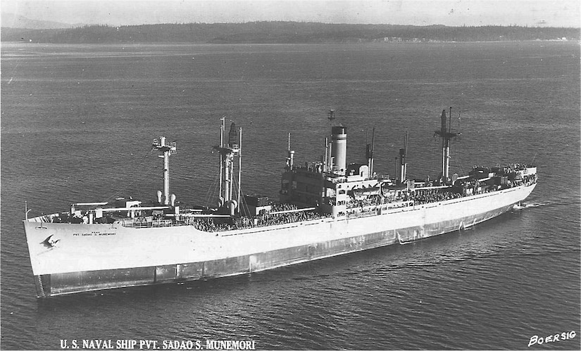 A large ship floats on the water.