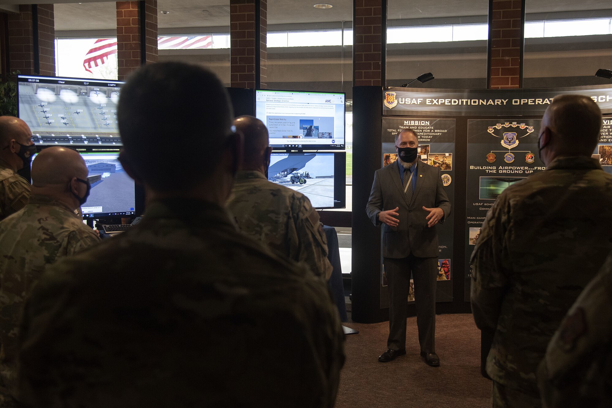 Christopher Leonard, 423rd Mobility Training Squadron Rapid Global Mobility Course instructor, explains what students learn during RGMC to Total Force Mobility Air Forces leadership during Total Force Phoenix Rally, April 21, 2021, at the U.S. Air Force Expeditionary Center headquarters on Joint Base McGuire-Dix-Lakehurst, New Jersey. U.S. Air Force Expeditionary Operations School instructors were given the opportunity to showcase how they contribute to AMC and its mission. (U.S. Air Force photo by Master Sgt. Ashley Hyatt)