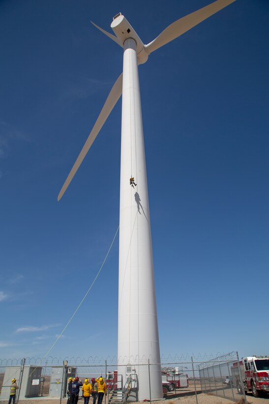 Grant Jaramillo, firefighter-paramedic with Fire and Emergency Services descends 230 feet from a wind turbine using ropes, and a self tracking boule device, as part of the Technical Rope Rescue training held aboard Marine Corps Logistics Base Barstow, California, April 15. The training, conducted by Tech Rescue Trainers, Inc. helps to prepare first responders to effectively respond to rescue scenarios that may be required if, for instance, an employee on base has a mishap in an elevated location.
