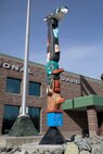 The honor pole that was built by George and James Bennett, a father-son duo from Sitka, sits in front of the Alaska Army National Guard armory April 27, 2021, days after it was restored. The pole is a momument that was built in 2007 and 2008, and is dedicated to the profound contributions of the Alaska Natives to the safety and heritage of the state in the past and present. (U.S. Army National Guard photo by Spc. Grace Nechanicky)