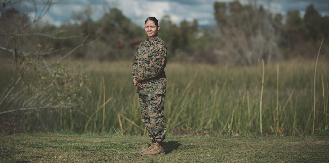 U.S. Marine Corps Gunnery Sgt. Guadualupe Castillo, a supply chief with 1st Transportation Support Battalion, poses for a portrait.