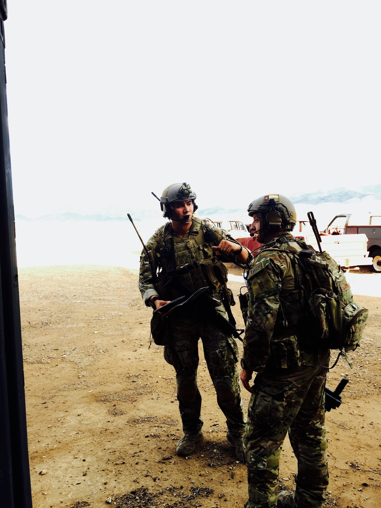 Photo of two Airmen training.