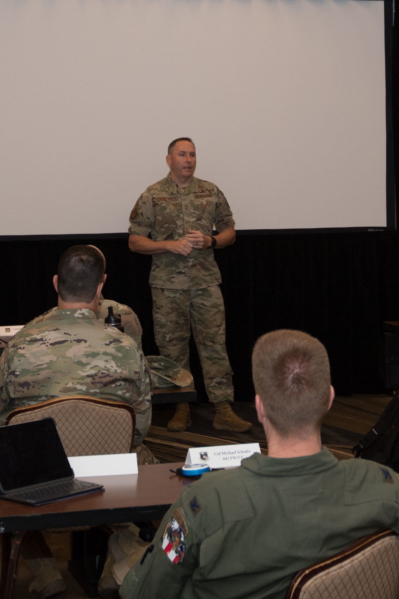 Chief Master Sgt Jeremy Malcom speaks with Tenth Air Force unit commanders, discussing his interaction with unit chiefs and answering questions about the enlisted force.