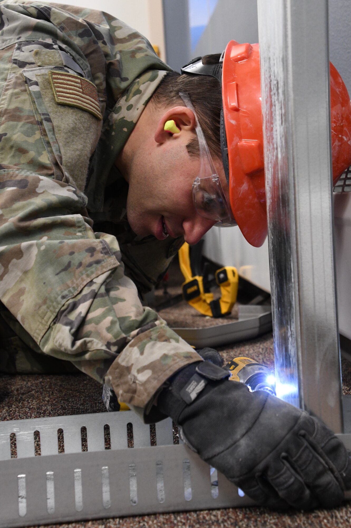Airman 1st Class Evan Offie is a structural journeyman in the 168th Wing Civil Engineering Squadron, learning the trade and serving in the Air National Guard. (U.S. Air National Guard photo by Senior Master Sgt. Julie Avey)