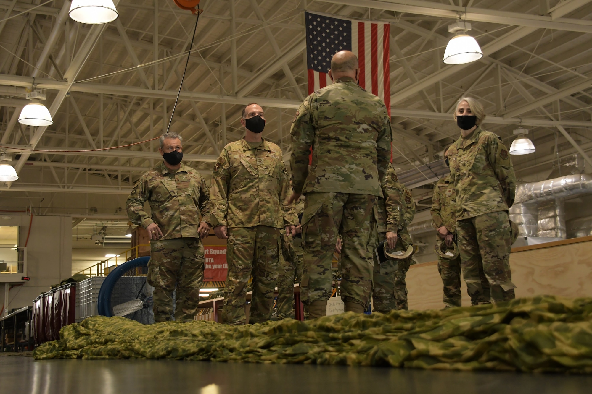 Maj. Gen. John P. Healy, 22nd Air Force commander, tours the 80th Aerial Port Squadron at Dobbins Air Reserve Base, Ga, on April 11, 2021. (U.S. Air Force Photo by Tech. Sgt. Miles Wilson)