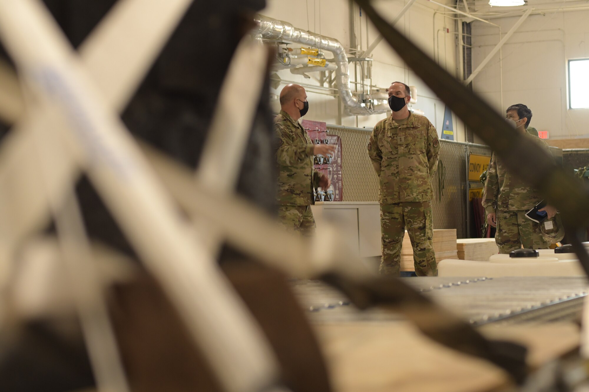 Maj. Gen. John P. Healy, 22nd Air Force commander, tours the 80th Aerial Port Squadron at Dobbins Air Reserve Base, Ga, on April 11, 2021. (U.S. Air Force Photo by Tech. Sgt. Miles Wilson)