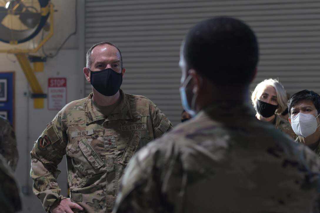 Maj. Gen. John P. Healy, 22nd Air Force commander, tours the 80th Aerial Port Squadron at Dobbins Air Reserve Base, Ga, on April 11, 2021. (U.S. Air Force Photo by Tech. Sgt. Miles Wilson)