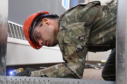 Airman 1st Class Evan Offie is a structural journeyman in the 168th Wing Civil Engineering Squadron, learning the trade and serving in the Air National Guard. (U.S. Air National Guard photo by Senior Master Sgt. Julie Avey)